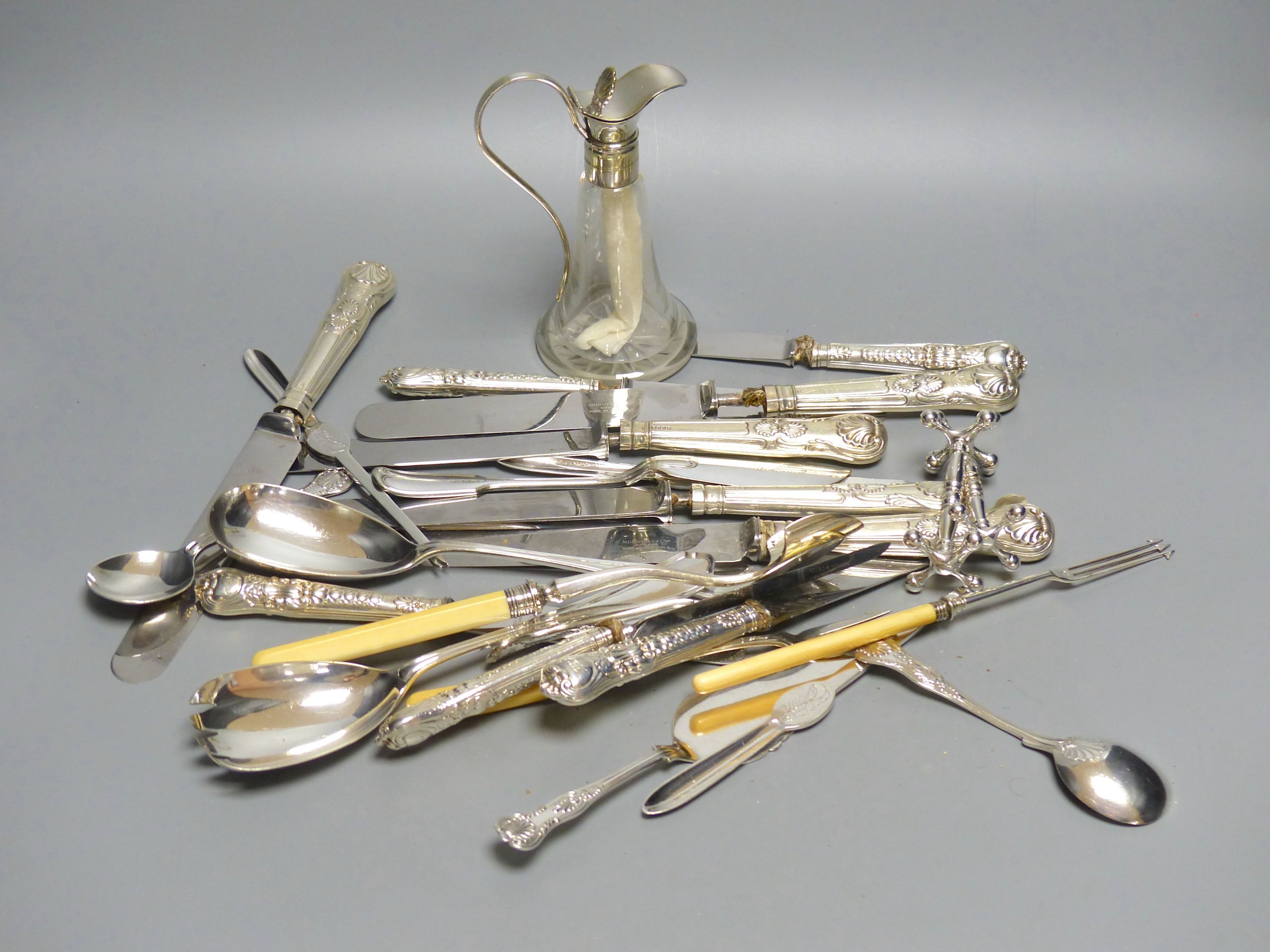 A small collection of silver and plated flatware, including a pair of silver Kings pattern jam spoons,